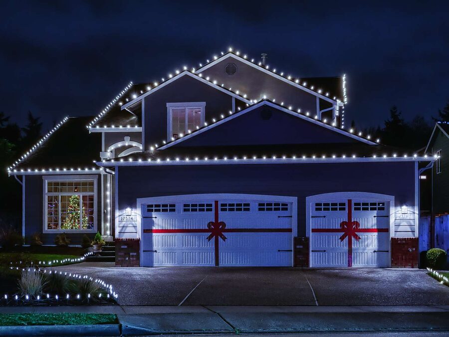 Home with professionally installed holiday lighting by Sterling Home Services